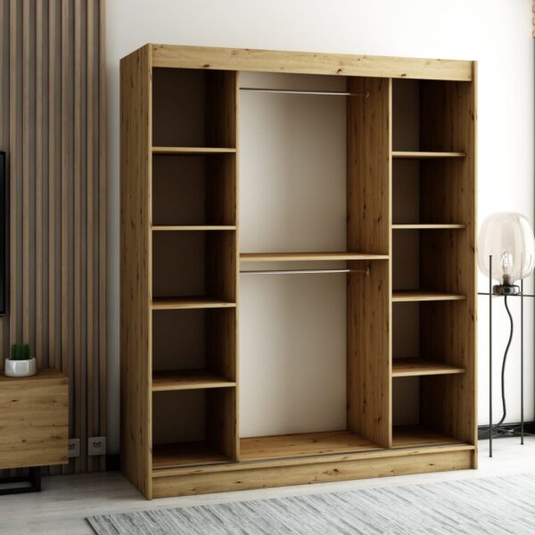 Het interieur van de kledingkast van 180 cm met legplanken, lades en kledingroedes voor hangers.