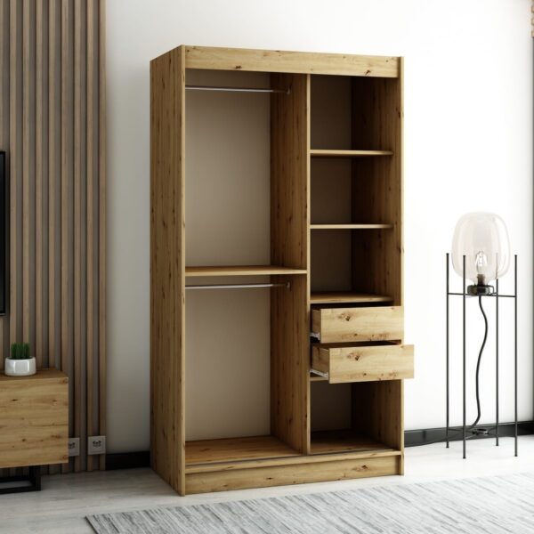 Het interieur van de LAMELO kledingkast van 120 cm met lades, legplanken en kledingroedes.