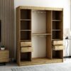 Het interieur van de kledingkast van 180 cm met legplanken, lades en kledingroedes voor hangers.