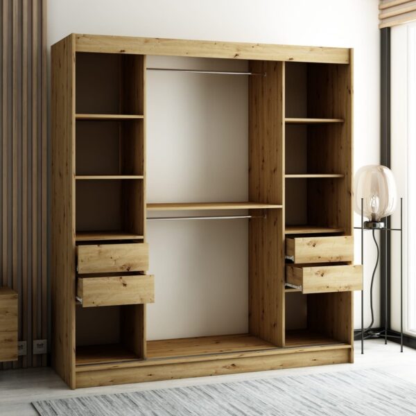 Het interieur van de kledingkast van 180 cm met lades, legplanken en kledingroedes voor hangers.