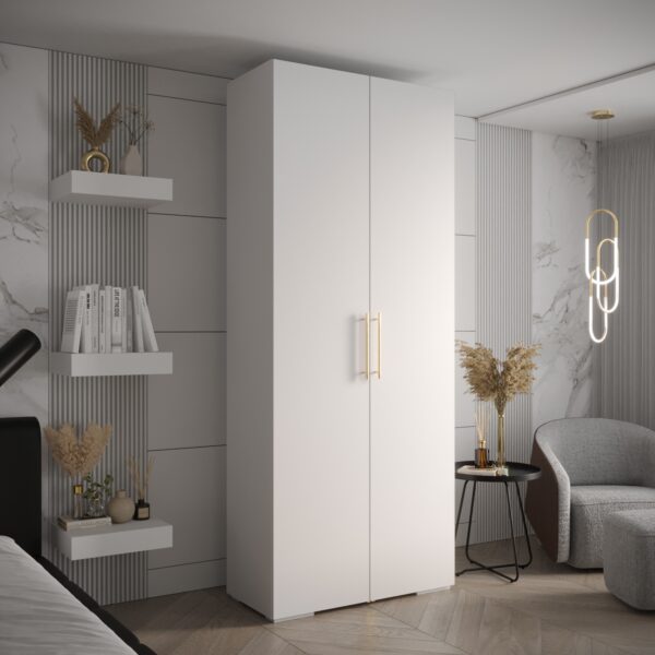 Kast met witte corpus, witte deuren en goude handgreep.